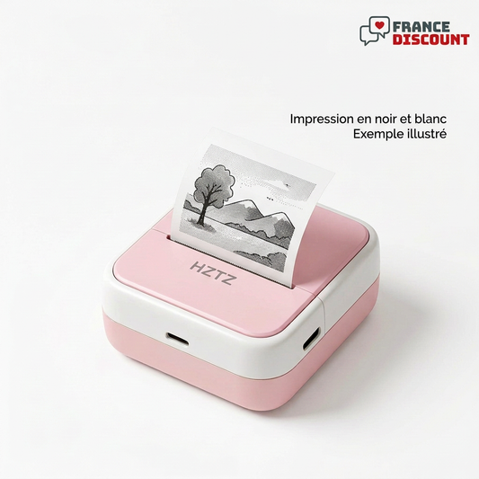 Mini-imprimante rose avec une impression de paysage noir et blanc sortant de la fente, exemple illustré