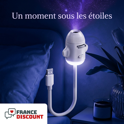 Projecteur fusée dans une ambiance étoilée bleu nuit et violet